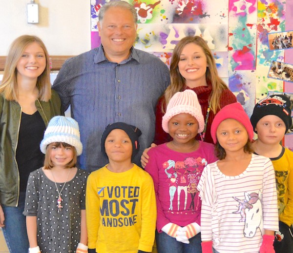 New winter hats, gloves spread smiles at Woodland Elementary