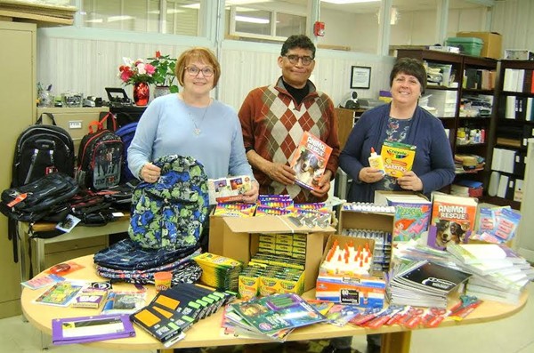 Altrusa provides school supplies for district's homeless students